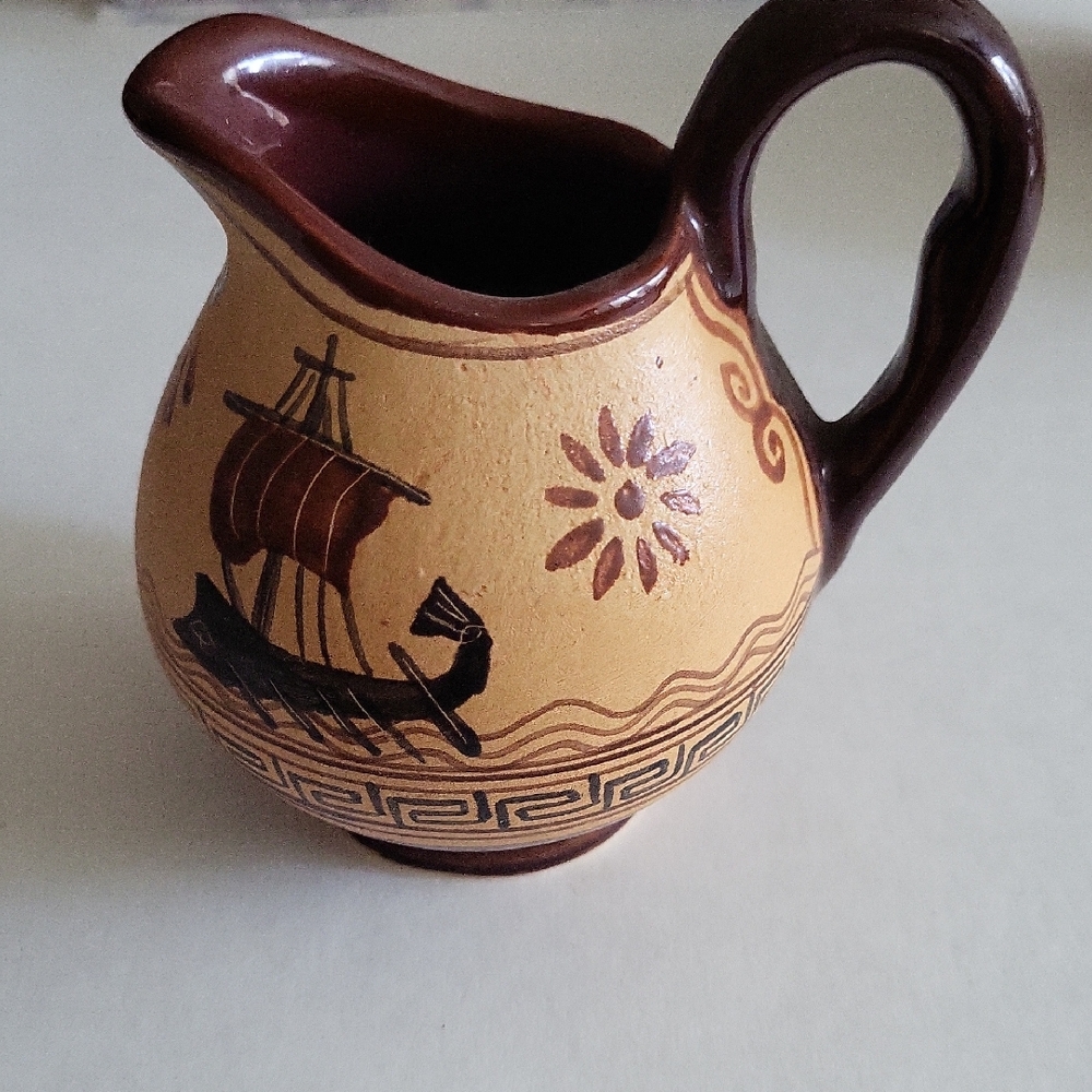 Brown and Tan Ceramic Pitcher with Geometric Patterns